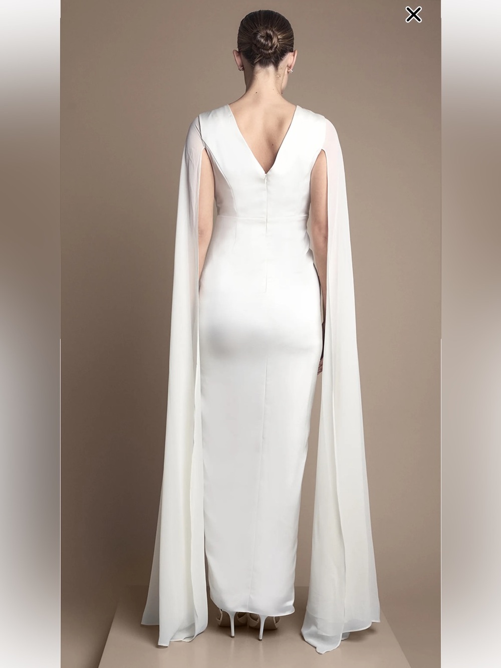 Sleek White V-Neck Wedding Dress with Draped Cape Detail - Picture 2 of 5